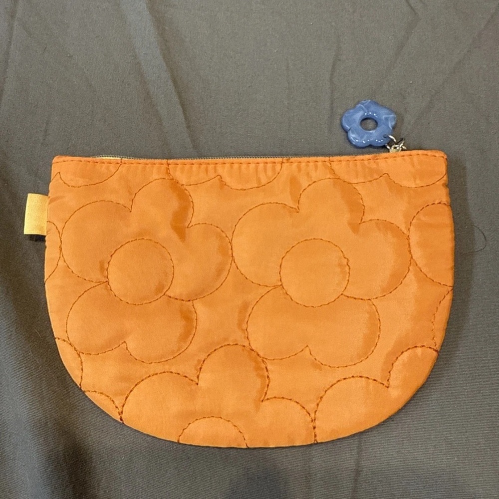 never used orange flower puffy ipsy makeup bag
